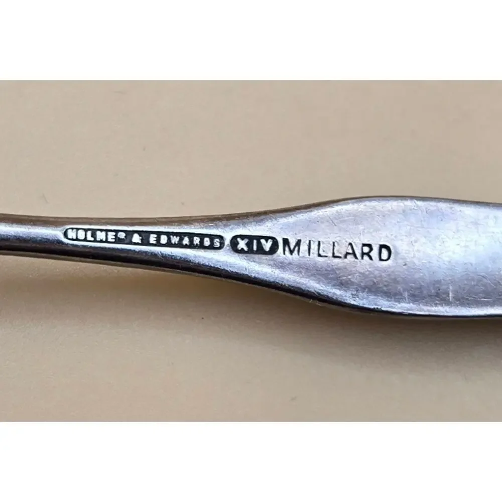 Holmes & Edwards engraved inside